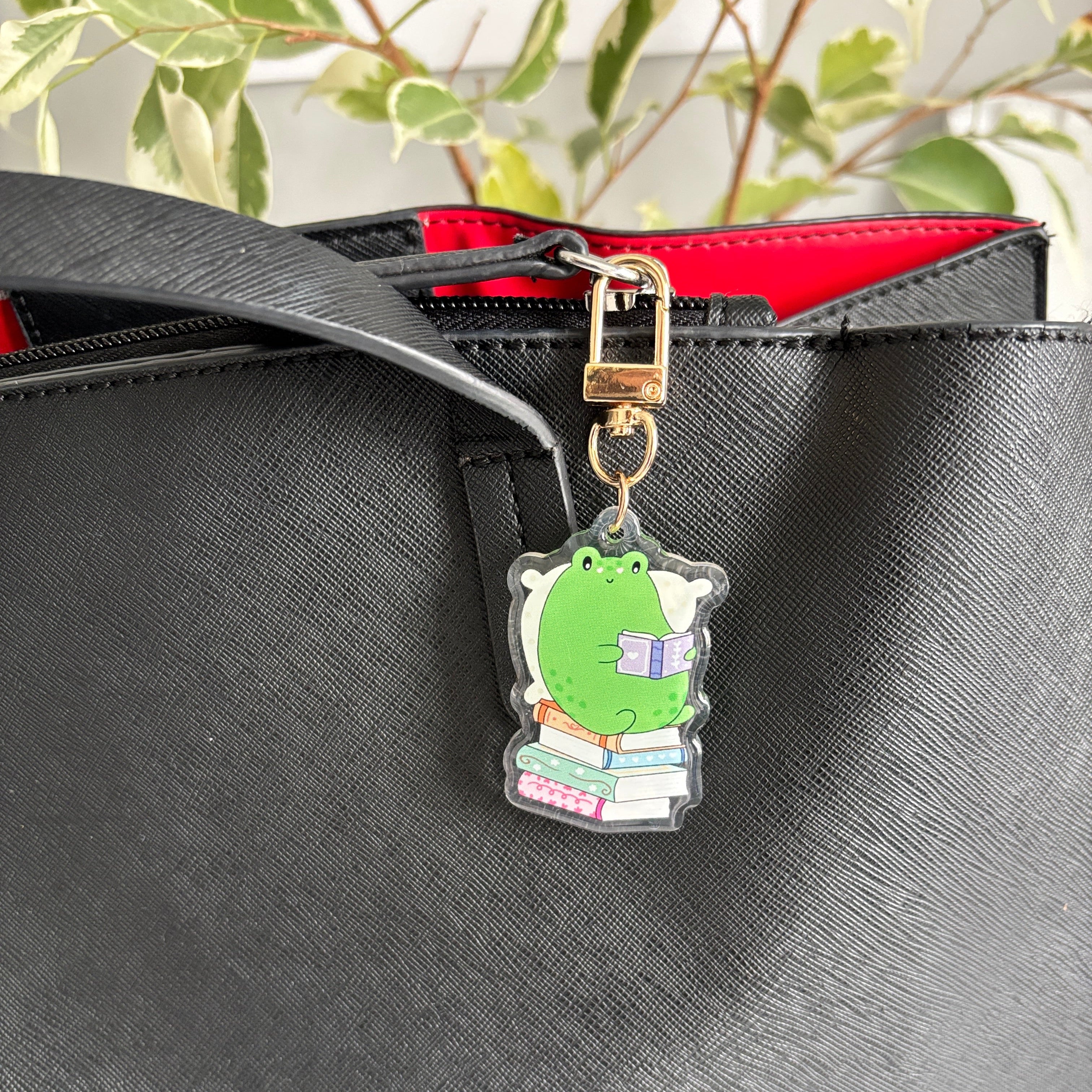 Cozy Frog Reading Acrylic Keychain